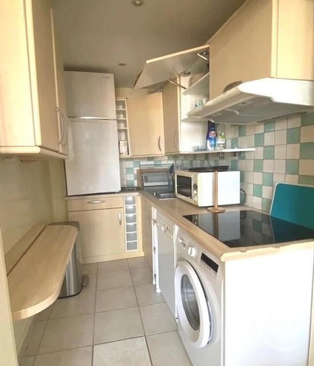 Appartement F2 à louer - 2 pièces - 48.0 m2 - NEUILLY SUR SEINE - 92 - ILE-DE-FRANCE - Century 21 Eric Sellier